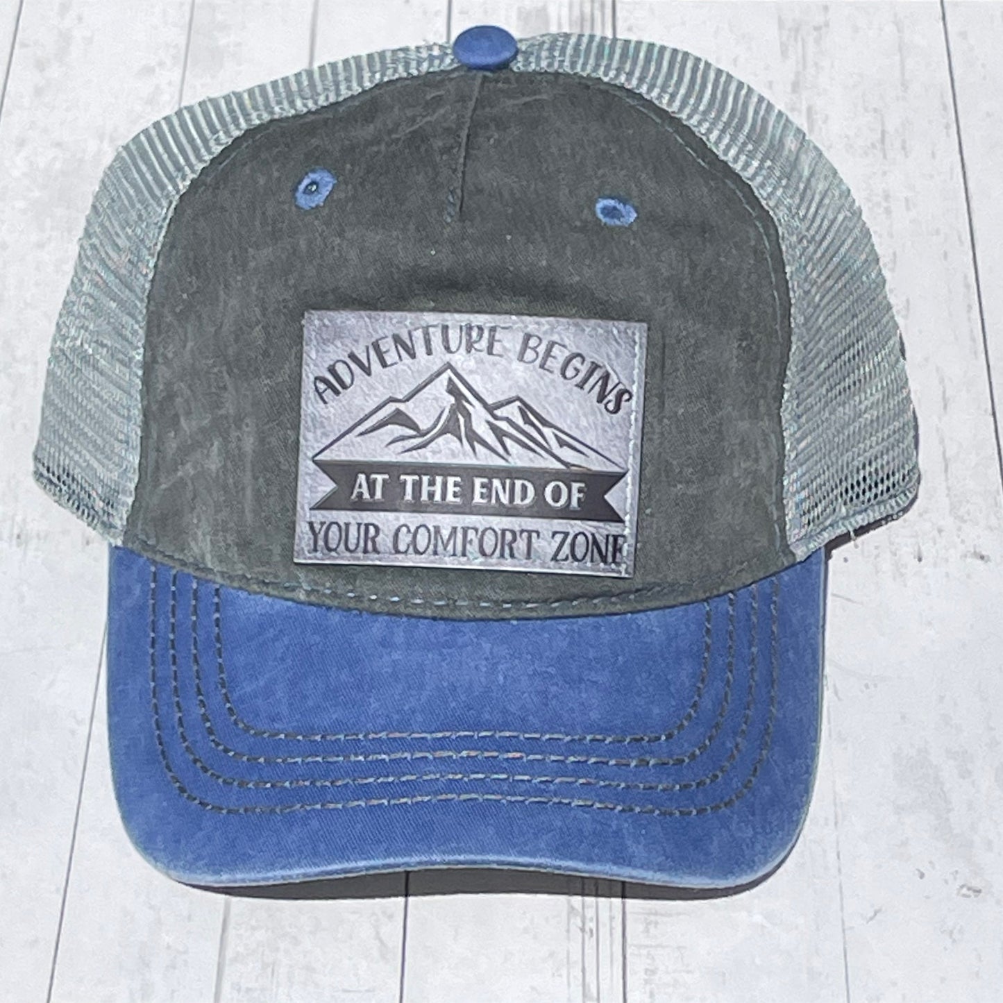 Gray and Blue Mesh Trucker Cap with Adventure Begins at the End of Your Comfort Zone Vegan Leather Patch