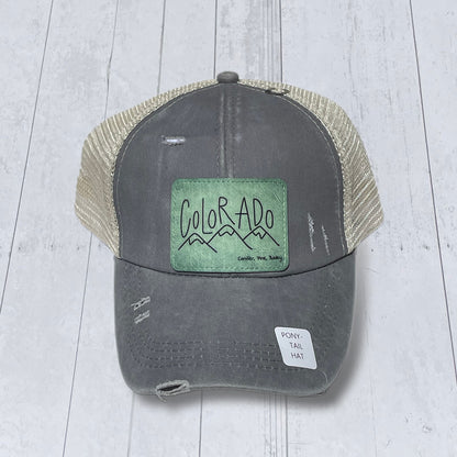 Gray and Tan Ponytail Distressed Mesh Trucker Cap Green Colorado Vegan Leather Patch