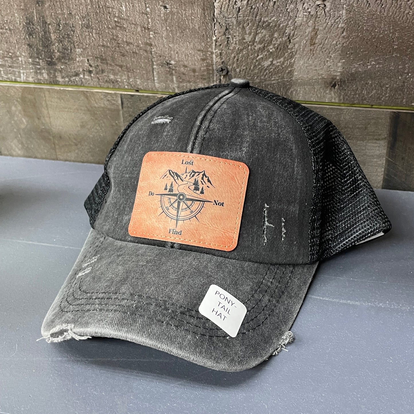 Gray and Black Ponytail Distressed Mesh Trucker Cap Lost Do Not Find Vegan Leather Patch